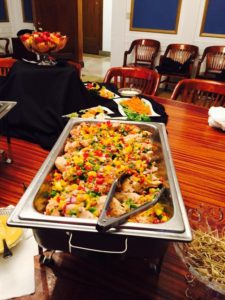 A tray of mango and pineapple salsa grilled chicken breast